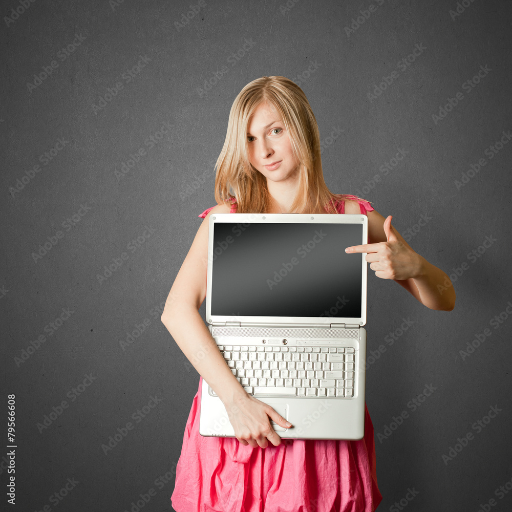 femaile in pink with open laptop femaile in pink with open laptop