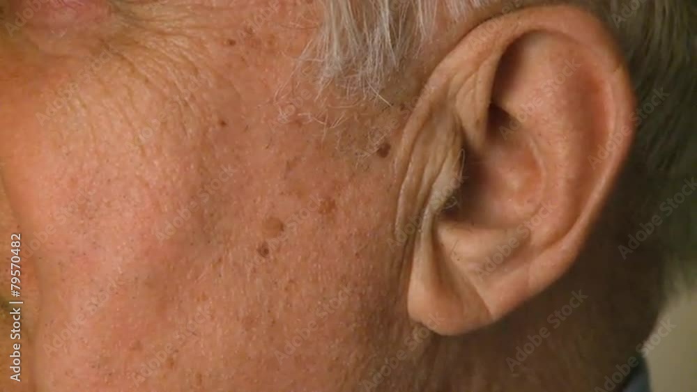 Close up shot of a male in his 70 Close up shot of a male in his 70