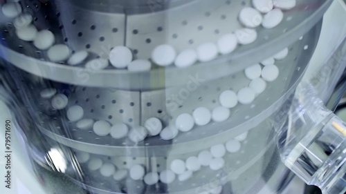 Pills on an production line at a pharmaceutical factory