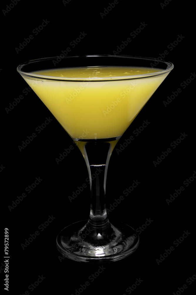 Cocktail in glass on black background isolated.
