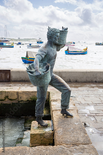 Fisherman's sculpture in Marsaxlokk, Malta