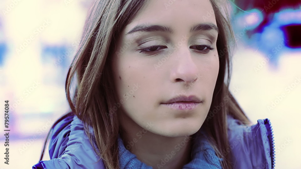 portrait of a beautiful sad girl. Slowmotion portrait of a beautiful sad girl. Slowmotion