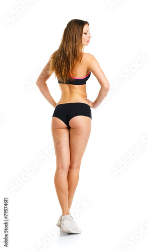 Athletic girl on white background, view from the back