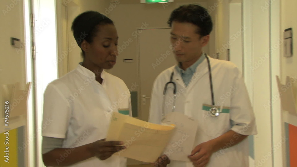 MS ZI OF DOCTORS READING A FILE MS ZI OF DOCTORS READING A FILE