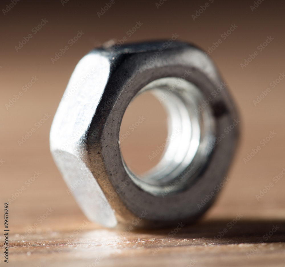 nut on the bolt. close-up nut on the bolt. close-up