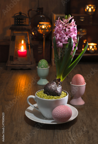 Delicate pink hyacinth on vintage kitchen photo