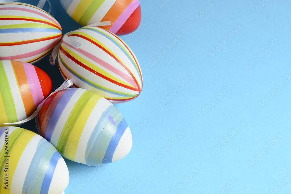Decorated Easter eggs on background