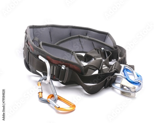 rock climbing harness and carabiner isolated on white background