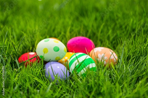 Colorful Easter eggs decorated in the grass