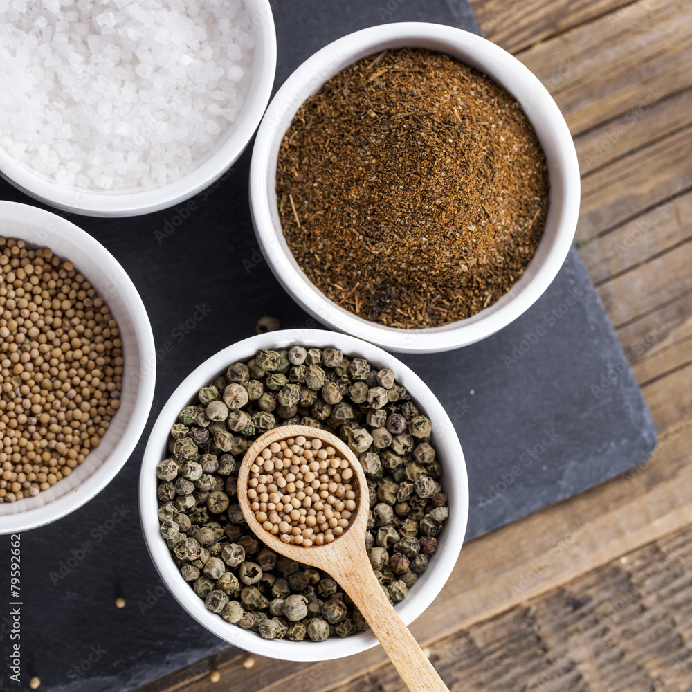 Aromatic spices in white bowls Aromatic spices in white bowls