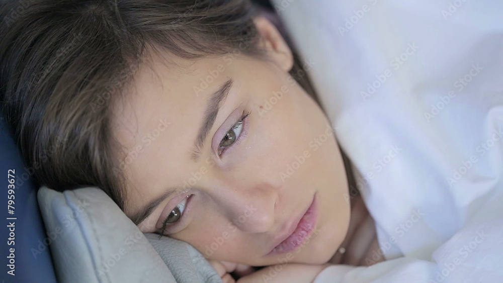 young beautiful woman sleeping on the couch young beautiful woman sleeping on the couch