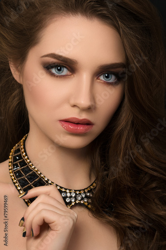 Portrait of young brunette beautiful woman