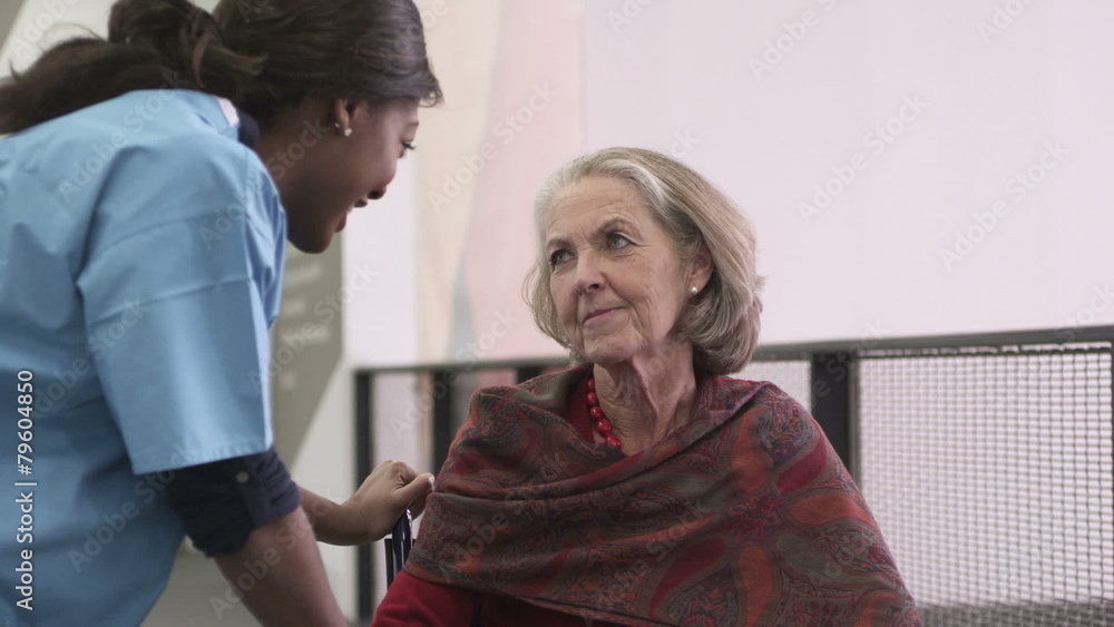 Female nurse talking with patient Female nurse talking with patient