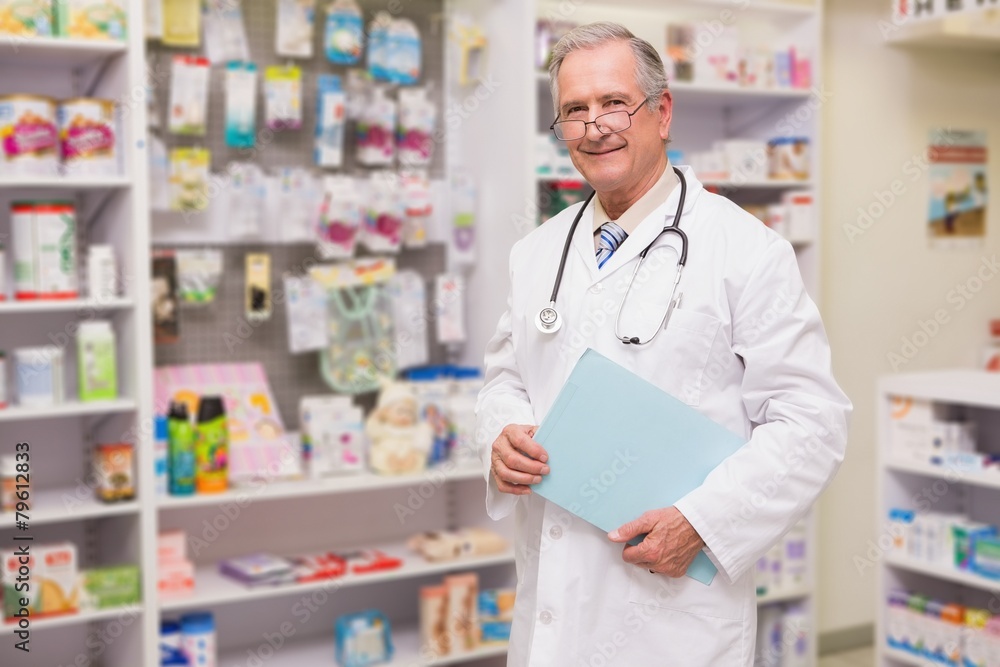 Smiling senior doctor holding files Smiling senior doctor holding files
