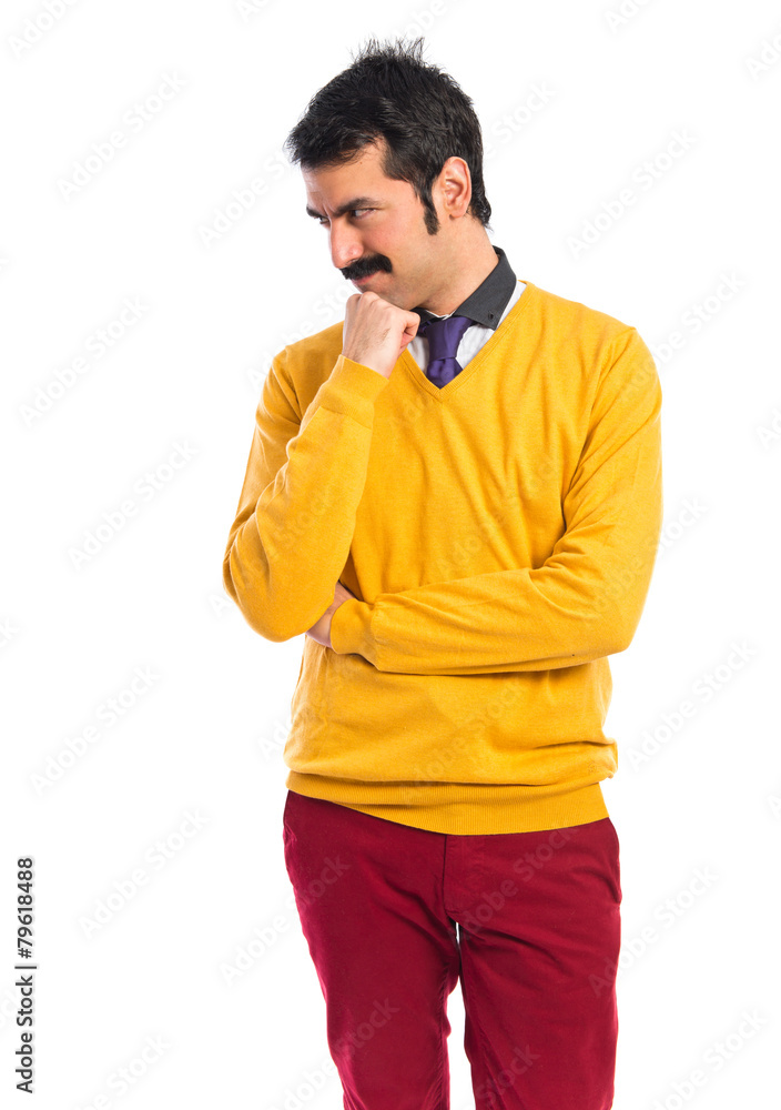 Man with moustache thinking over white background