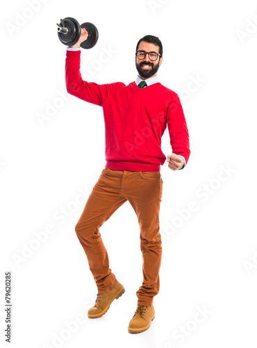 Hipster man doing weightlifting
