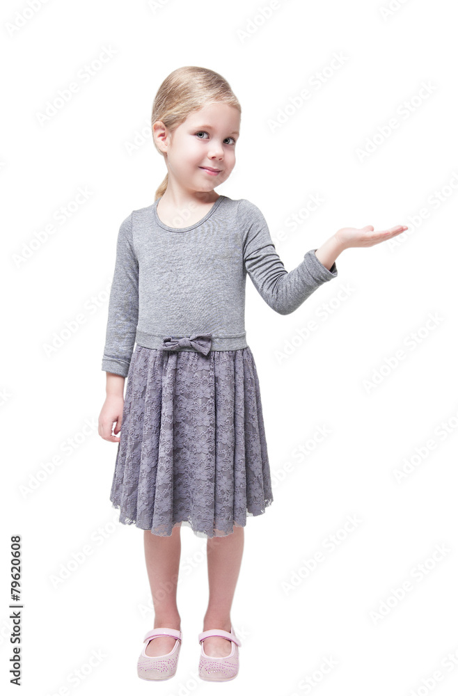 Beautiful little girl presenting something on her hand isolated Beautiful little girl presenting something on her hand isolated