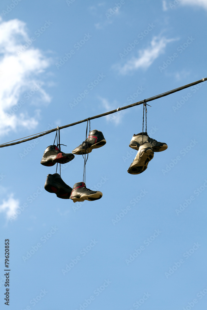 Sneakers Hanging on a Telephone Line Sneakers Hanging on a Telephone Line