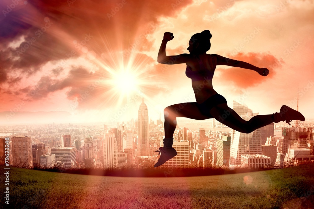 Composite image of fit brunette running and jumping