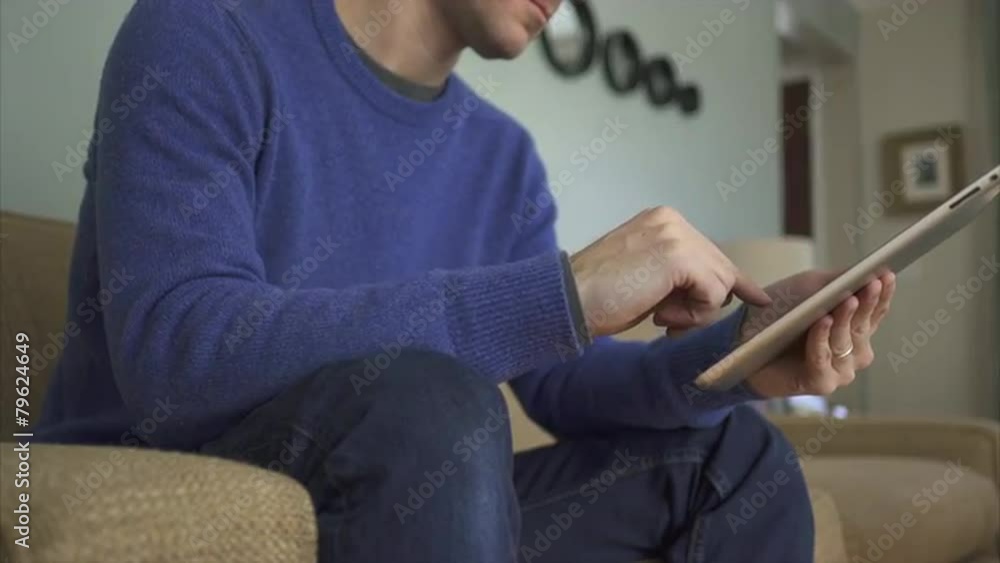 Different views of a man using electronic devices in a home. Different views of a man using electronic devices in a home.