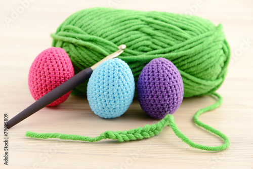 Canvas Print crocheting easter eggs in green, pink, blue and purple