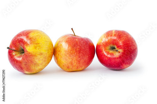 juicy red apples isolated on white
