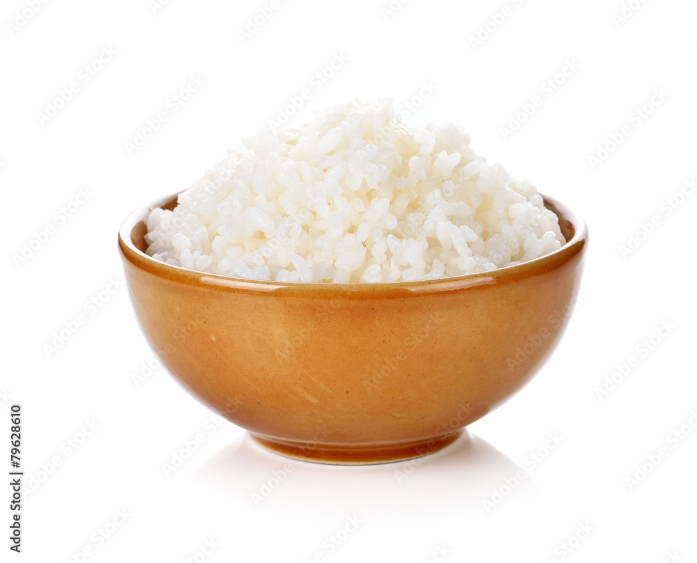 Rice in a bowl on a white background Rice in a bowl on a white background
