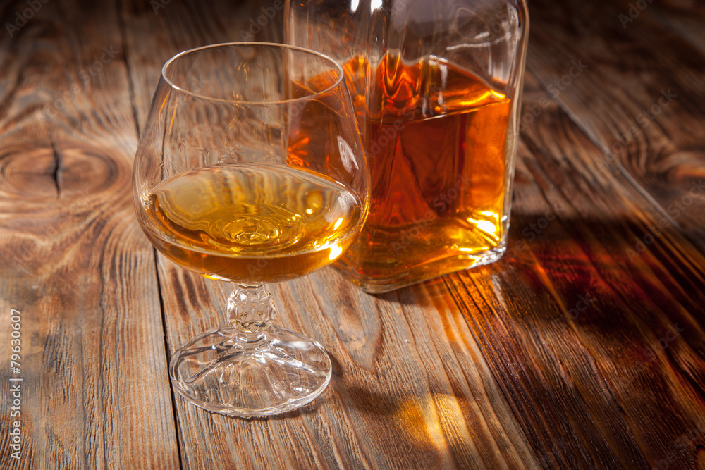 Bottle of brandy and a glass Bottle of brandy and a glass