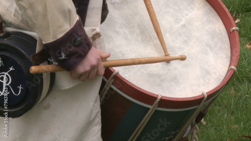 Drummer drums during a revolutionary war battle reenactment