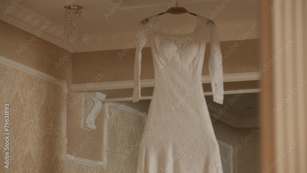 Wedding dress on a hanger Wedding dress on a hanger