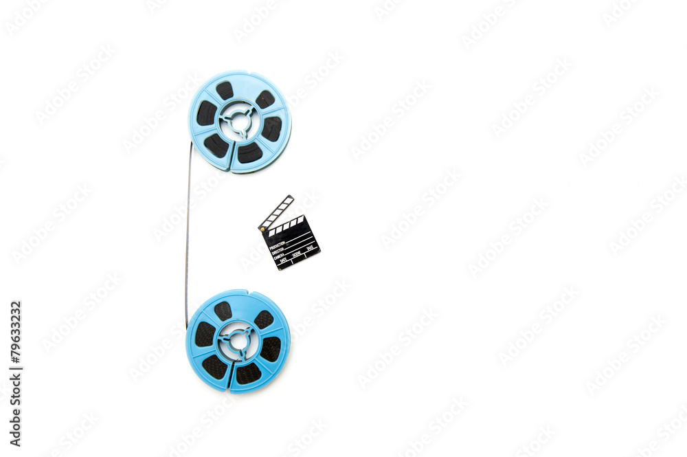 Vintage 8mm blue movie reels and little clapper white background