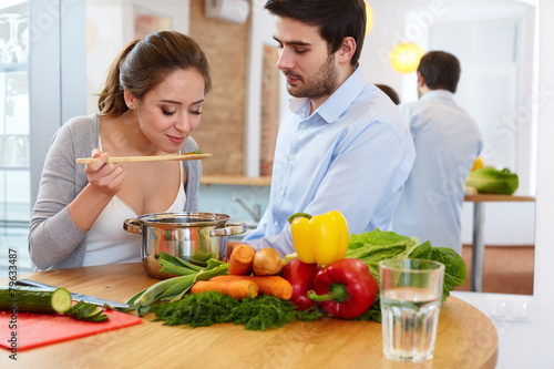 Couple Cooking Food in Kitchen. Healthy lifestyle