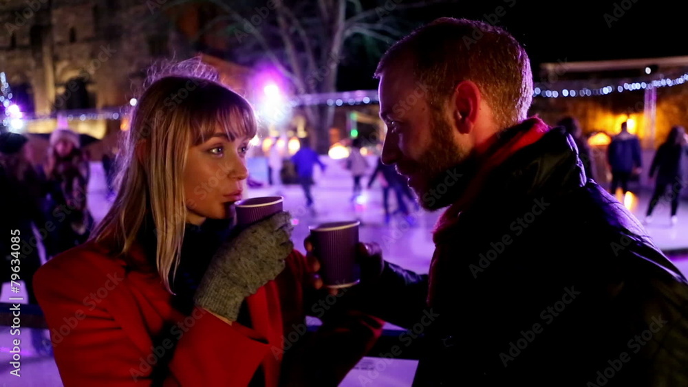 Attractive happy couple in love out on a date Attractive happy couple in love out on a date