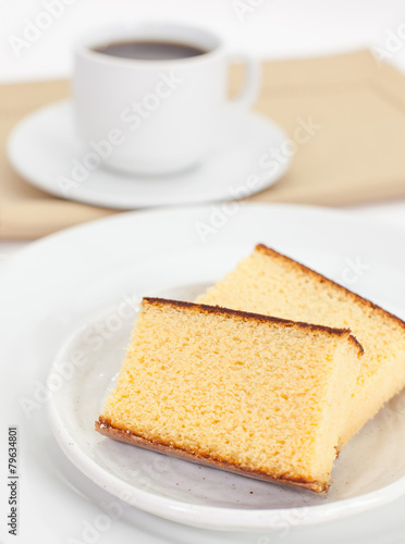 Close - up Sponge cake on white ceramic plate