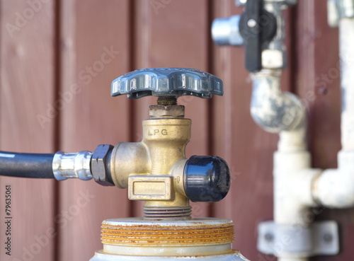 Close - up metal valve gas on tank .