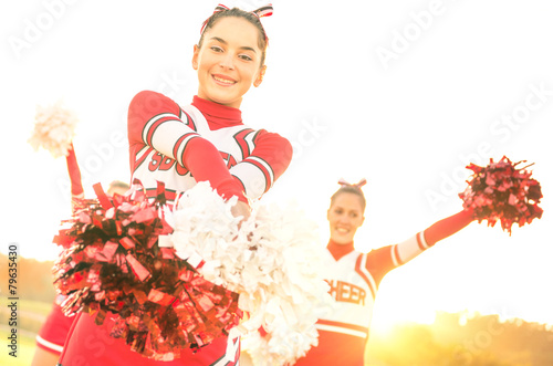 Canvastavla Group of cheerleaders performing outdoors at high school camp