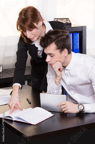 Business man and business woman teamwork in the office.