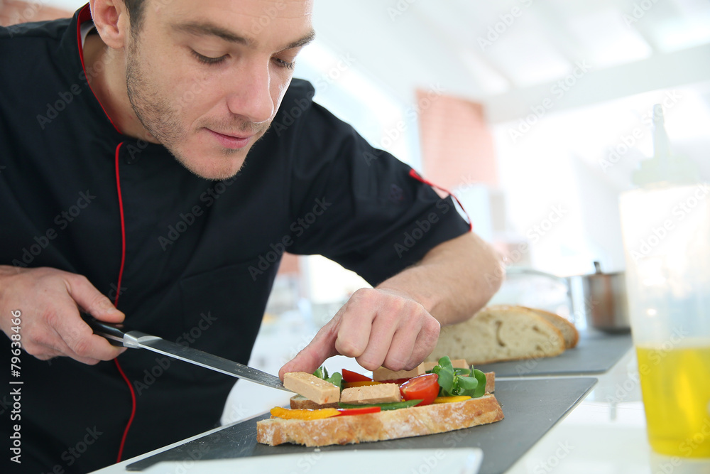 Chef preparing delicatessen disg