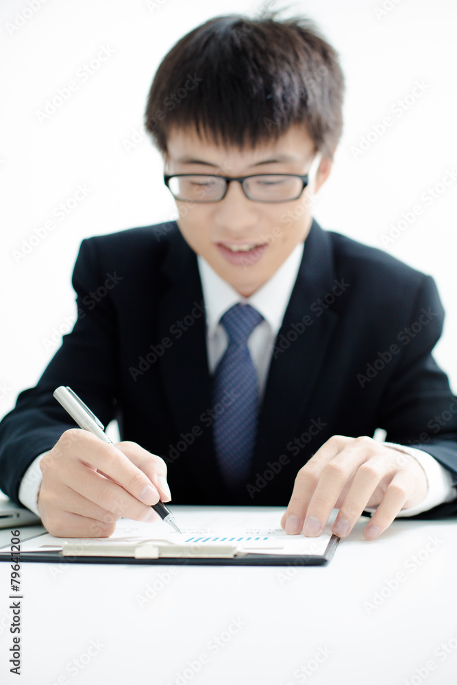 Businessman analyzing investment charts. Accounting Businessman analyzing investment charts. Accounting