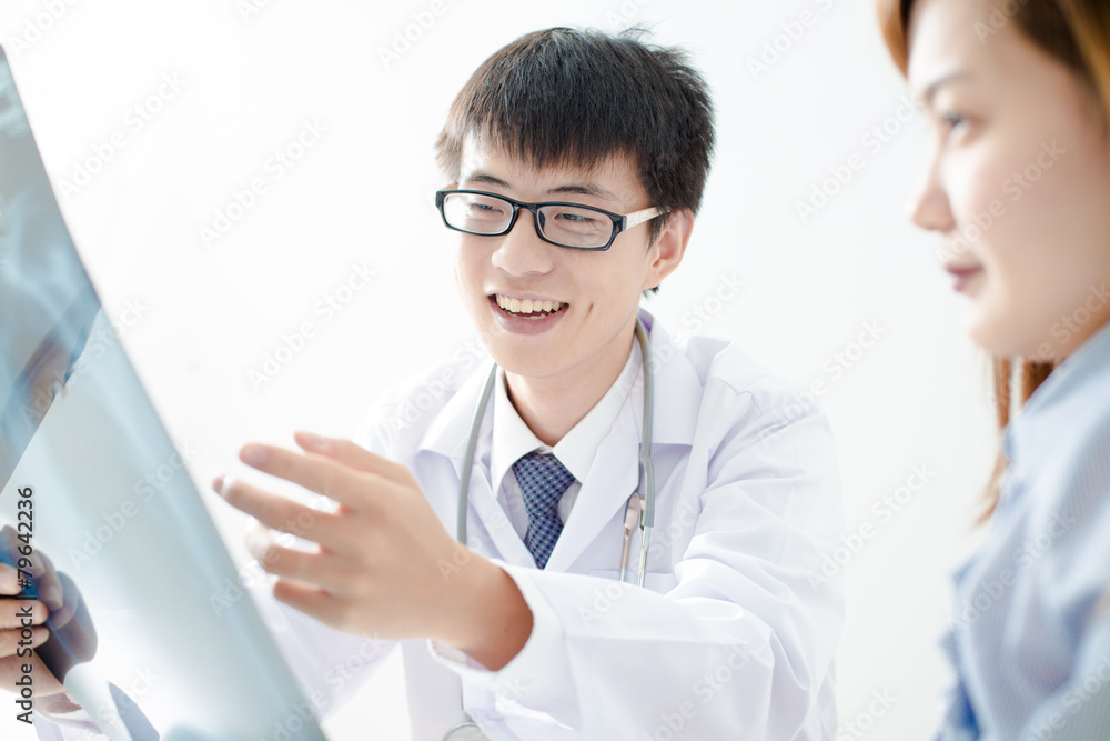 bright picture of male doctor with patient bright picture of male doctor with patient