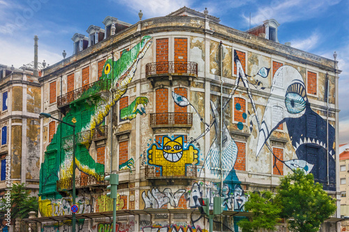 Lisbon street art. graffiti green crocodile, Portugal.