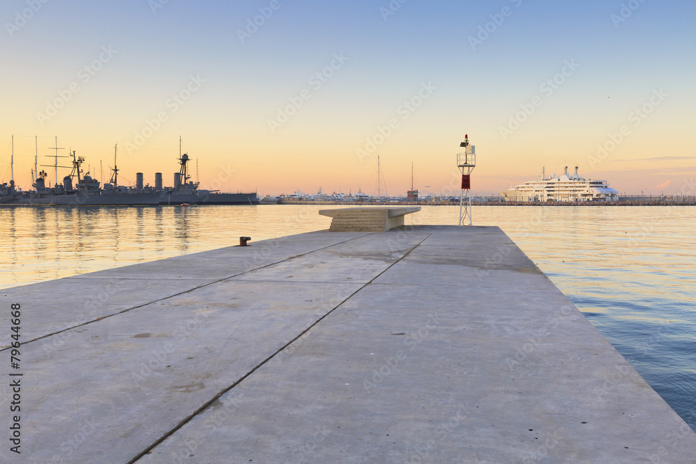 Harbour light and ships in Faliro, Athens, Greece.