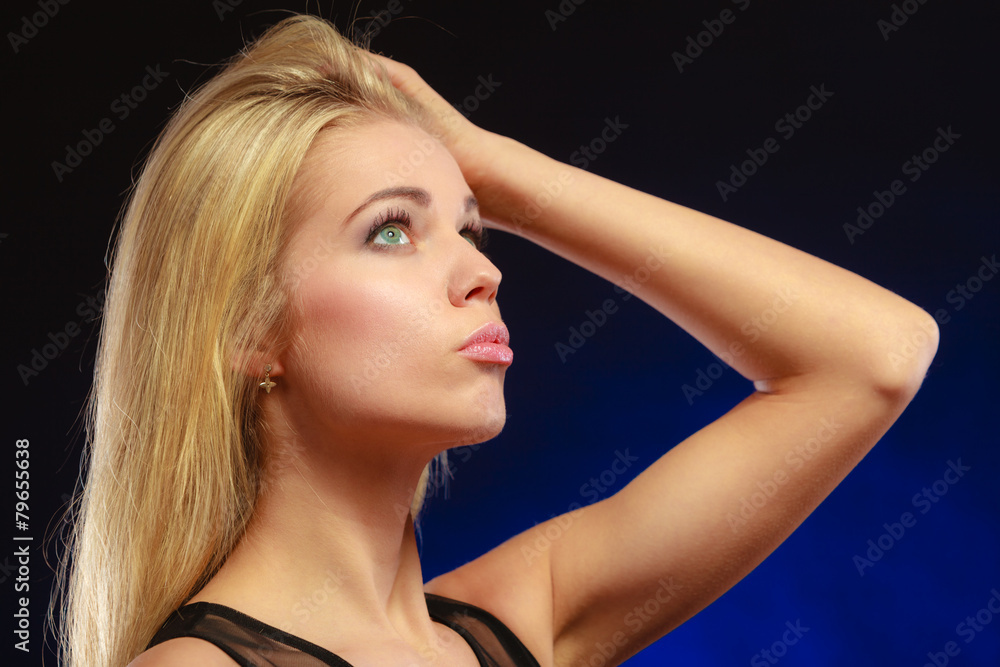 Fototapeta premium Portrait pensive girl long blond hair