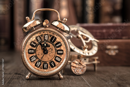 Vintage alarm clock showing five to twelve. Happy New Year 2015!