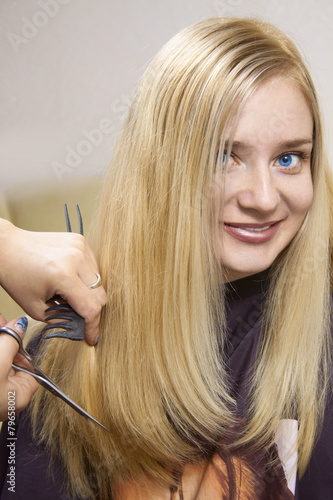 Hairdresser giving a new haircut