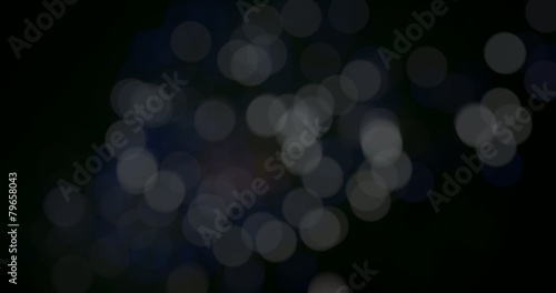 Blurred fairy lights from fireworks background.