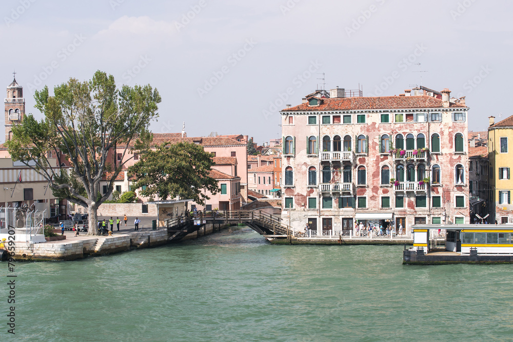 Quay and bridge over channel in Venice