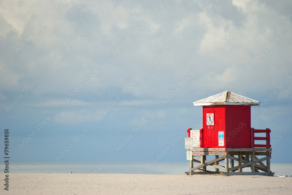 Obraz premium Red lifeguard beach shack