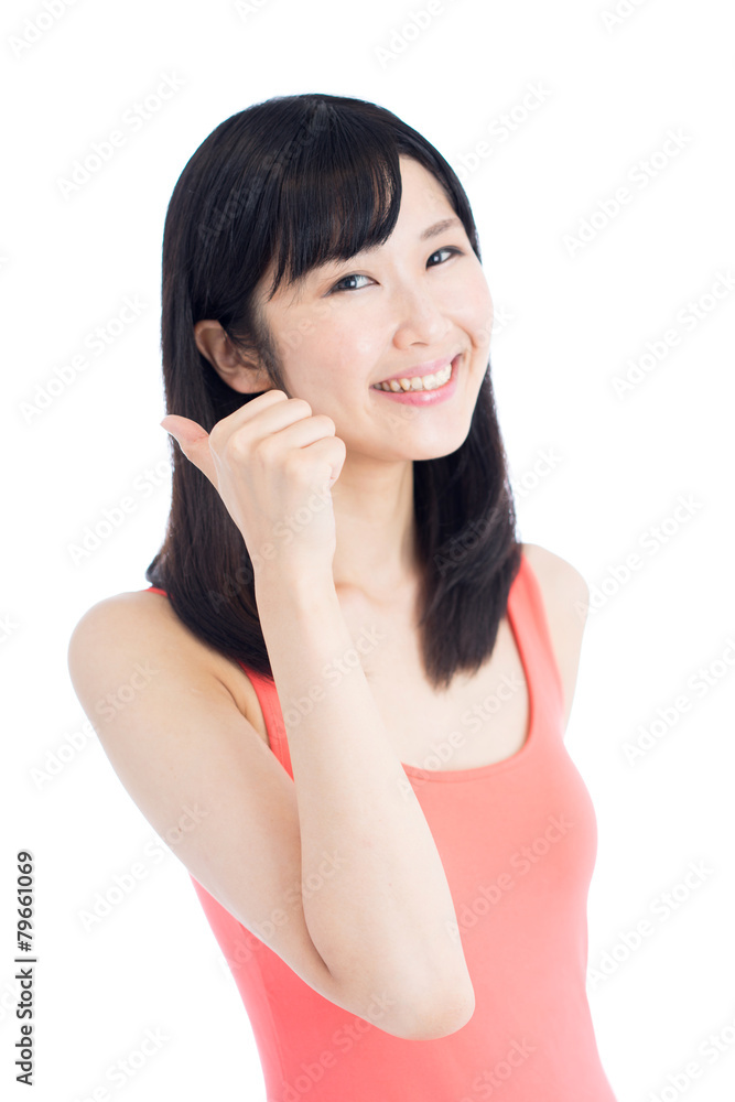 親指を立てるジェスチャーをする女性 親指を立てるジェスチャーをする女性