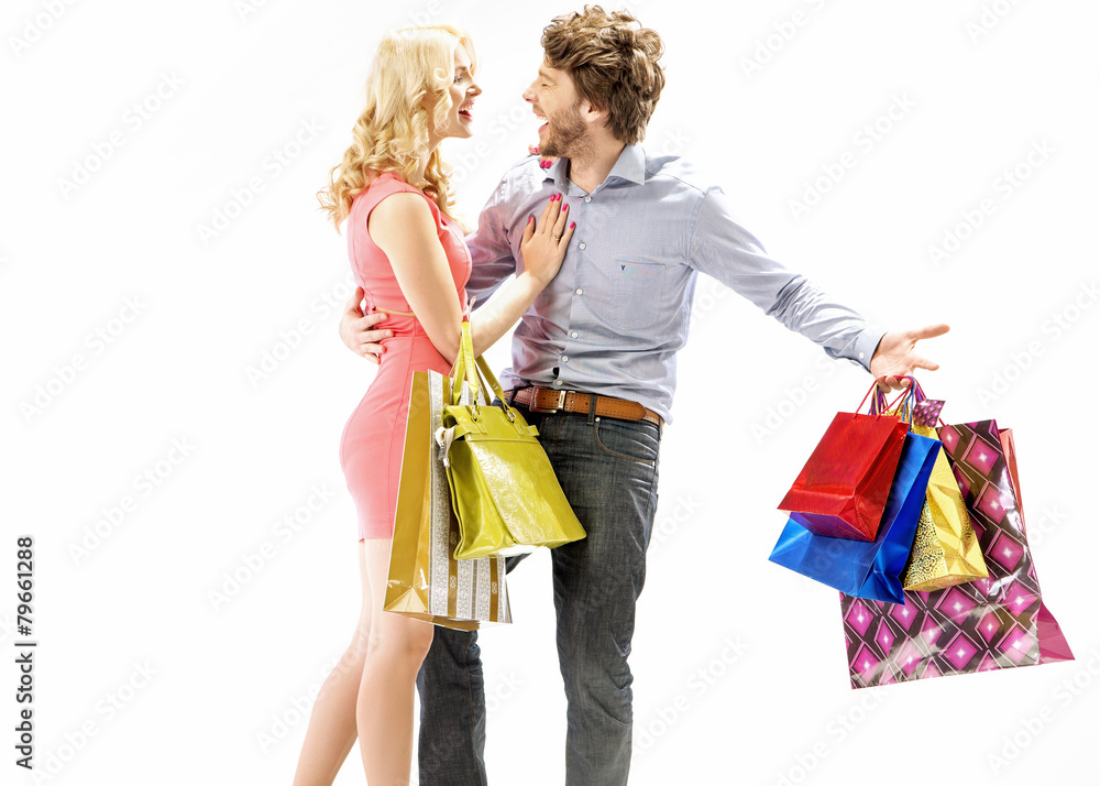 Laughing couple enjoying the shopping
